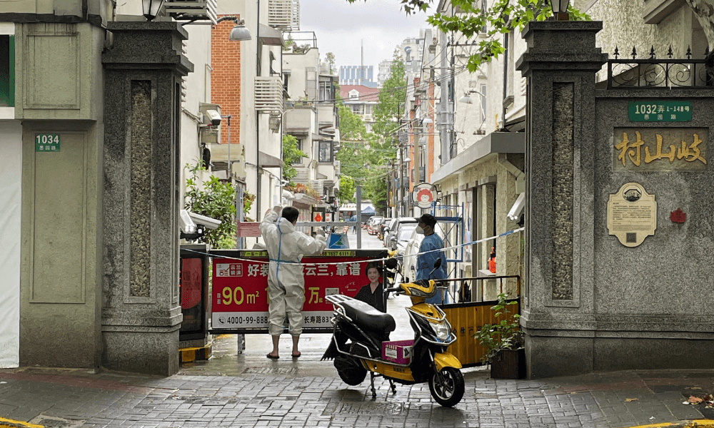 Shanghai Fences Up COVID-Hit Buildings, Fuelling Fresh Outcry